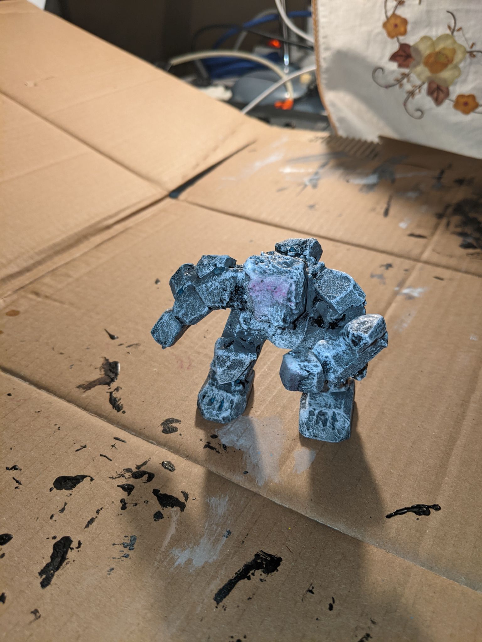 A picture of a painted stone golem build with XPS foam